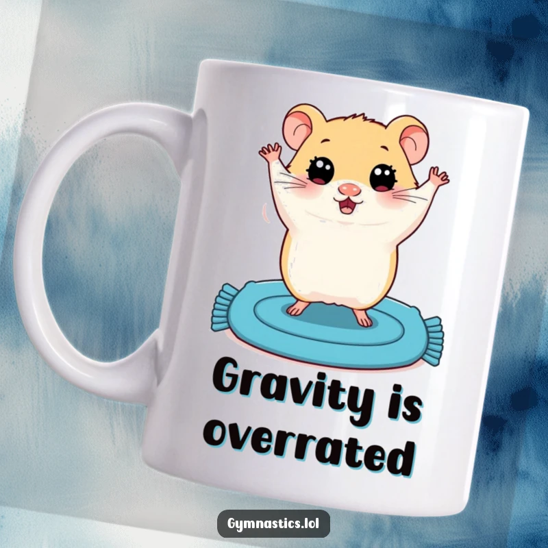 Funny mug featuring a plump hamster with wide eyes, precariously balancing in a shaky handstand on a blue mat.