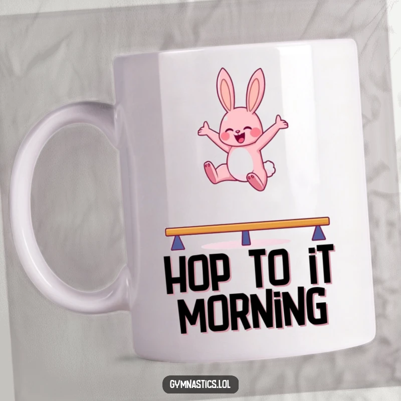 Funny bunny balance beam mug featuring a pink bunny leaping high in the air with arms outstretched, embodying playful gymnastics.