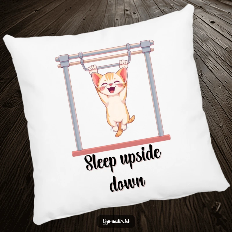 Funny kitten pillow showing a giggling kitten hanging upside down from uneven bars, providing comfort with a humorous and adorable design.