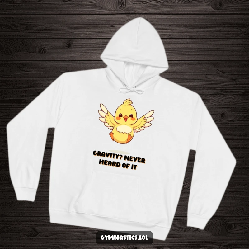 Funny chick with outstretched wings landing a jump, designed on a comfy hoodie for humorous warmth.