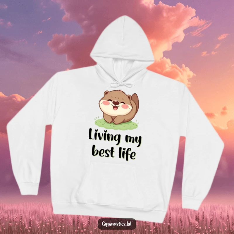 Funny hoodie with a happy, fluffy otter in a joyful tumble on grass, offering warmth and a touch of hilarious, cute animal action.