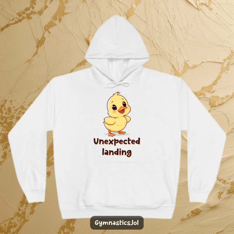 Funny wobbly duckling tumbling forward with a surprised expression, on a cozy hoodie, spreading cheer and humor.