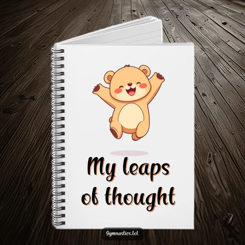 Funny notebook with a joyful, round bear cub performing a graceful leap in the air, inspiring creativity.