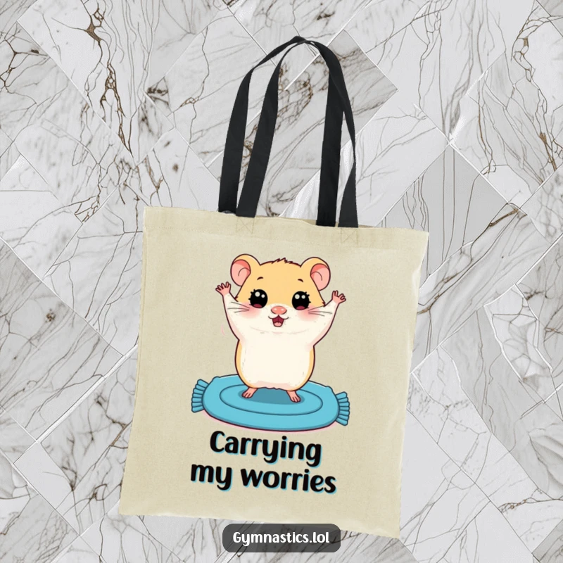 Funny tote bag featuring a plump hamster with wide eyes, trying a shaky handstand on a small blue mat for comedic effect.