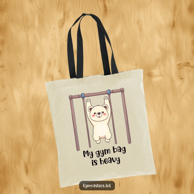Funny Bear Gym Tote Bag: A proud bear hangs upside down from uneven bars, making this tote bag a humorous and practical carry-all.